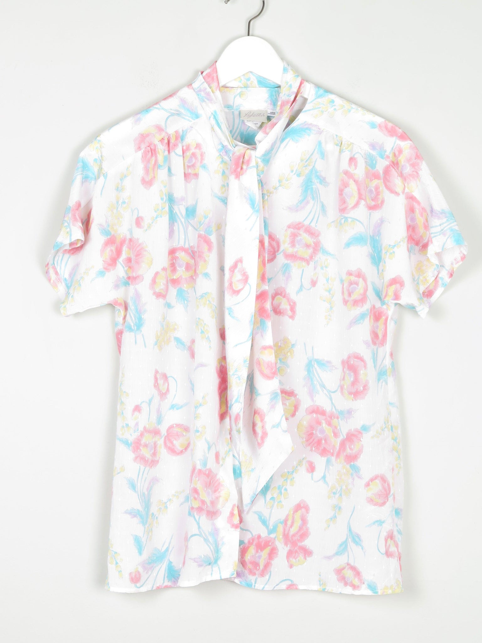 Women’s Floral Short-Sleeved Blouse With Tie Neck S - The Harlequin